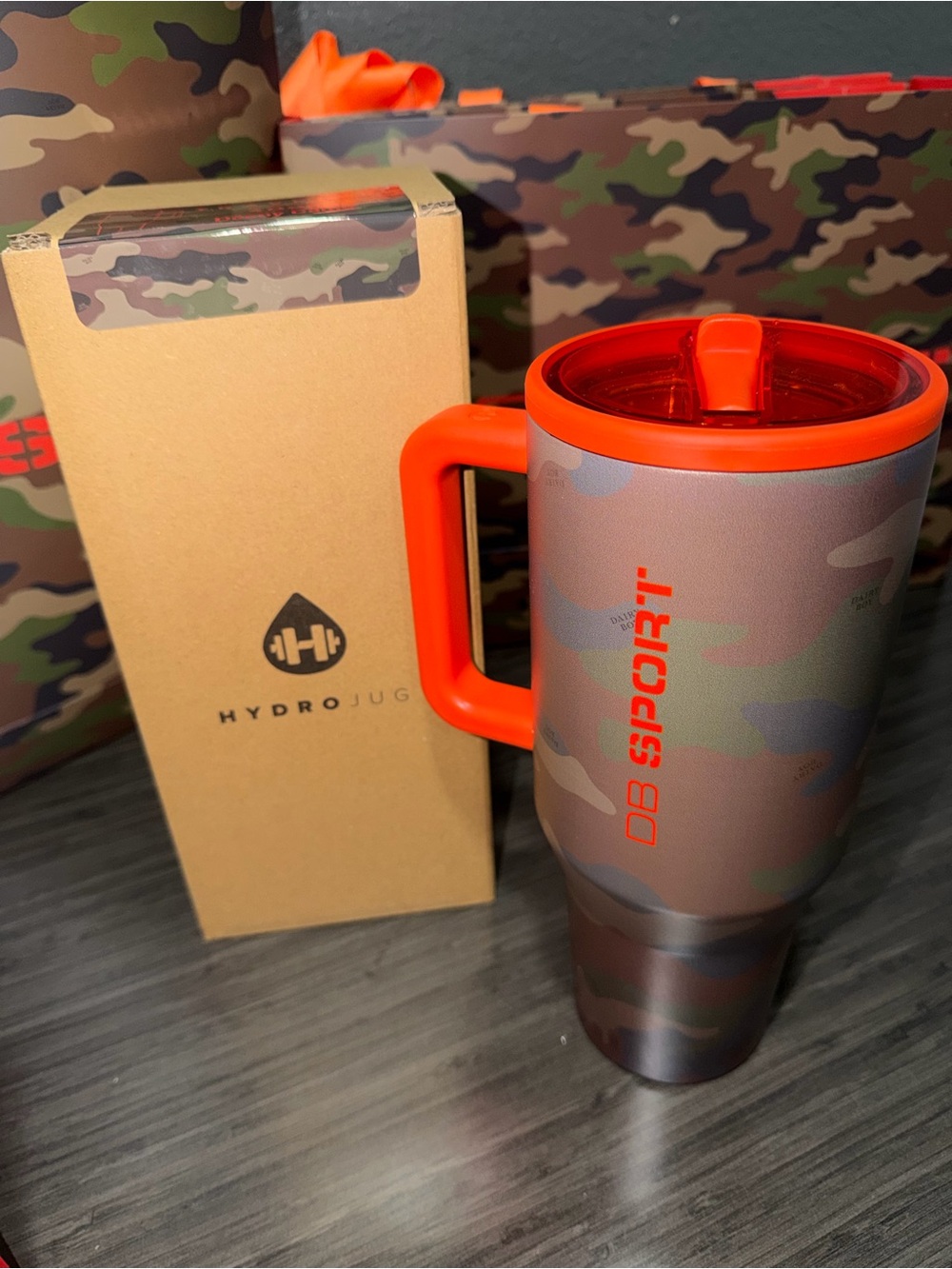 DAIRY BOY 40oz HydroJug Camo Travel Mug with Orange Lid & Handle